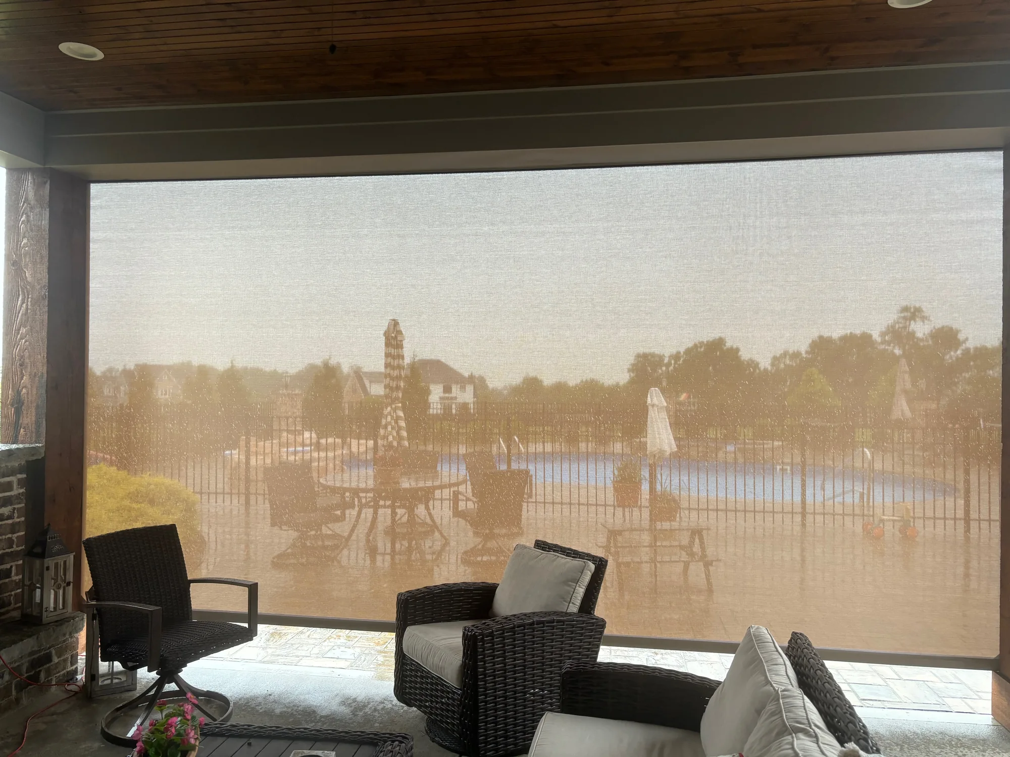 Exterior patio shades shading a Texas room in the afternoon