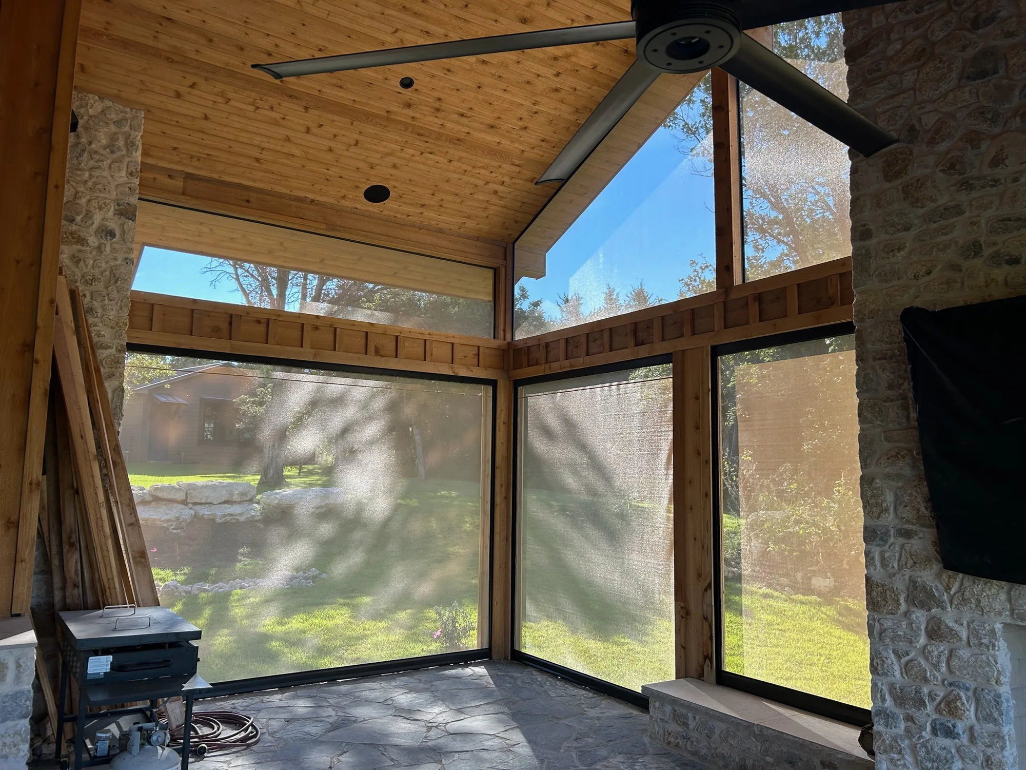 Exterior patio shades installed by Love Is Blinds in a Texas living space