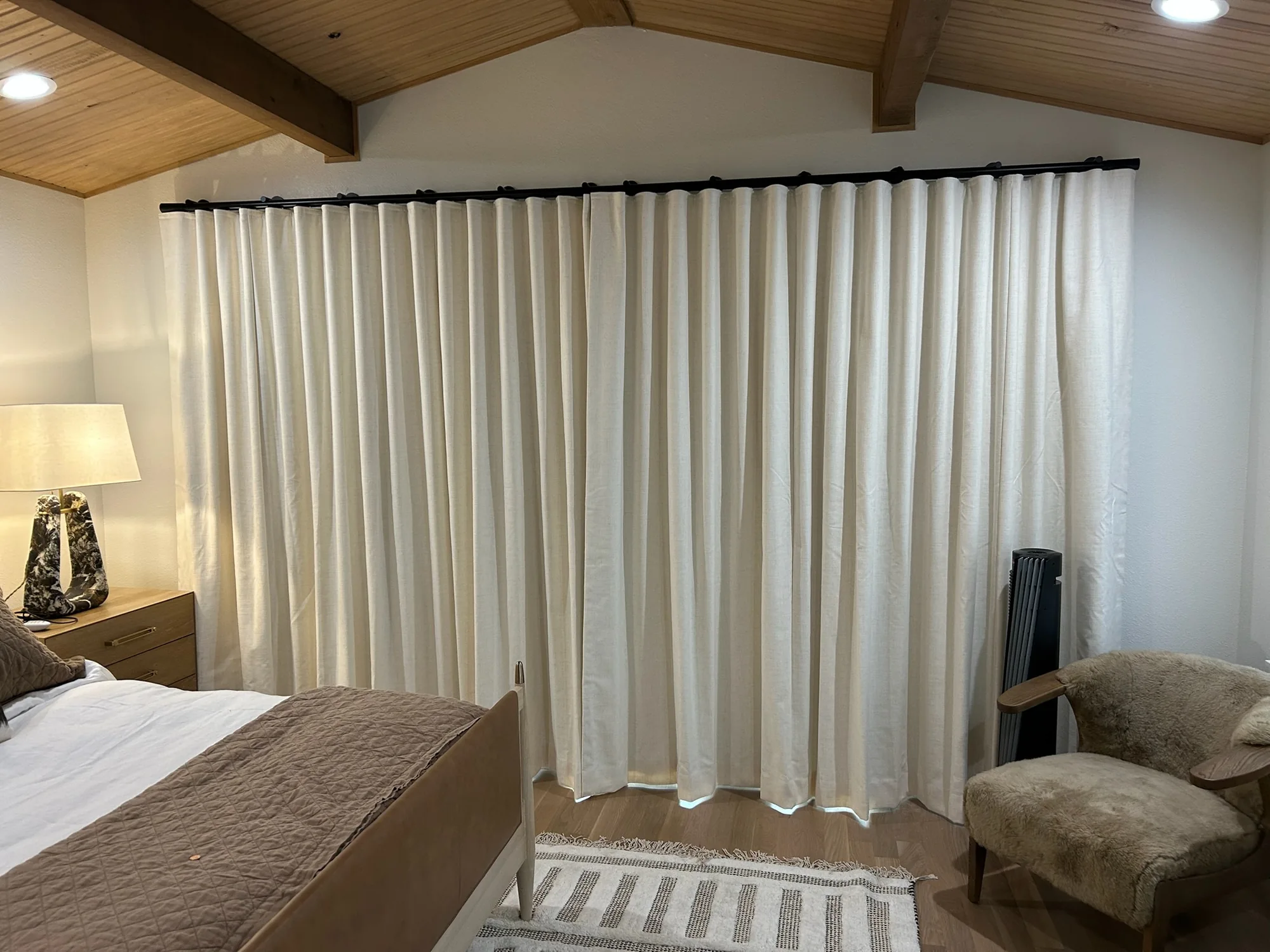 Close view of Drapery and motorization installed by Love Is Blinds