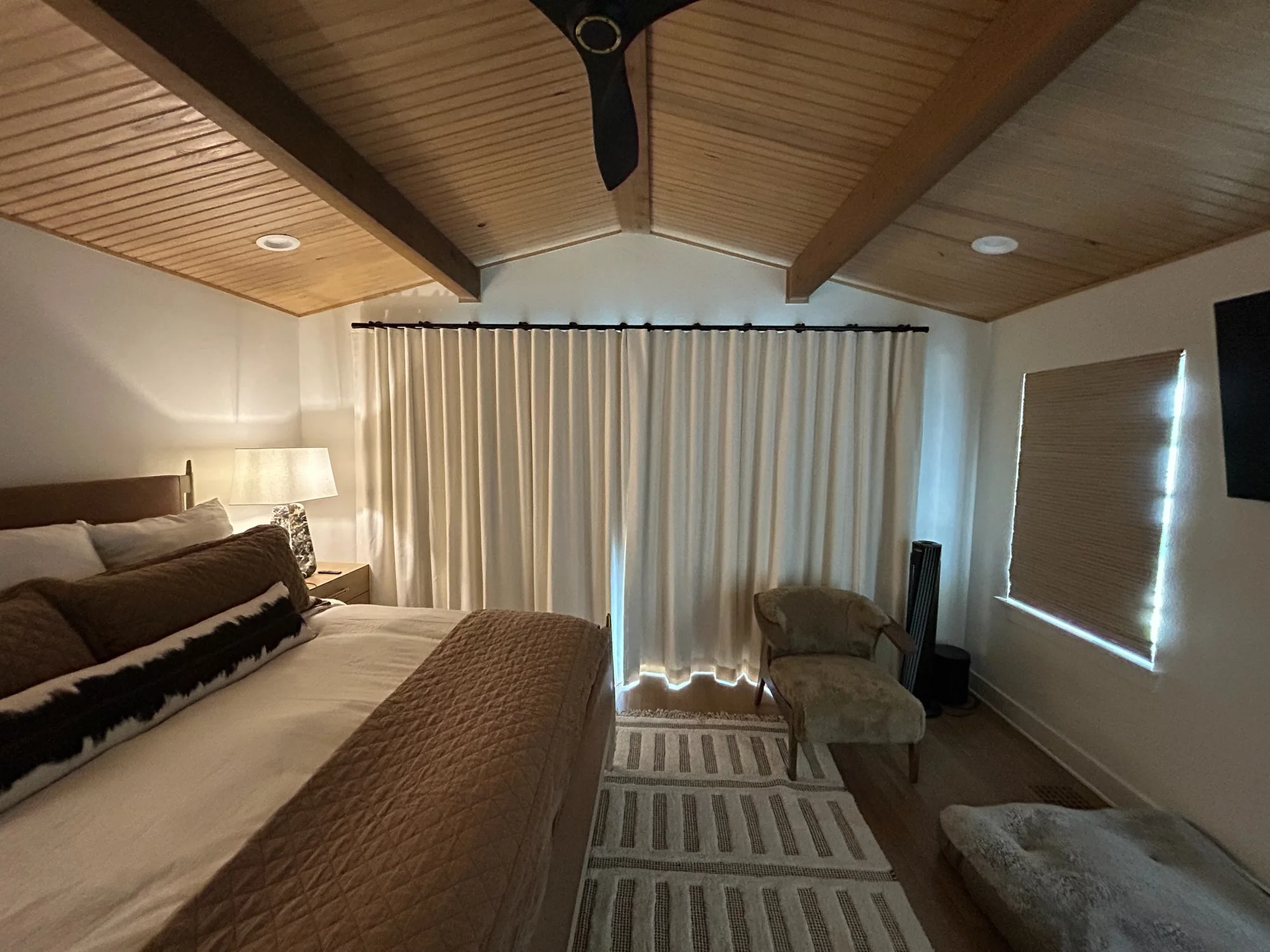 Drapery and motorization fitted to the window opening by Love Is Blinds