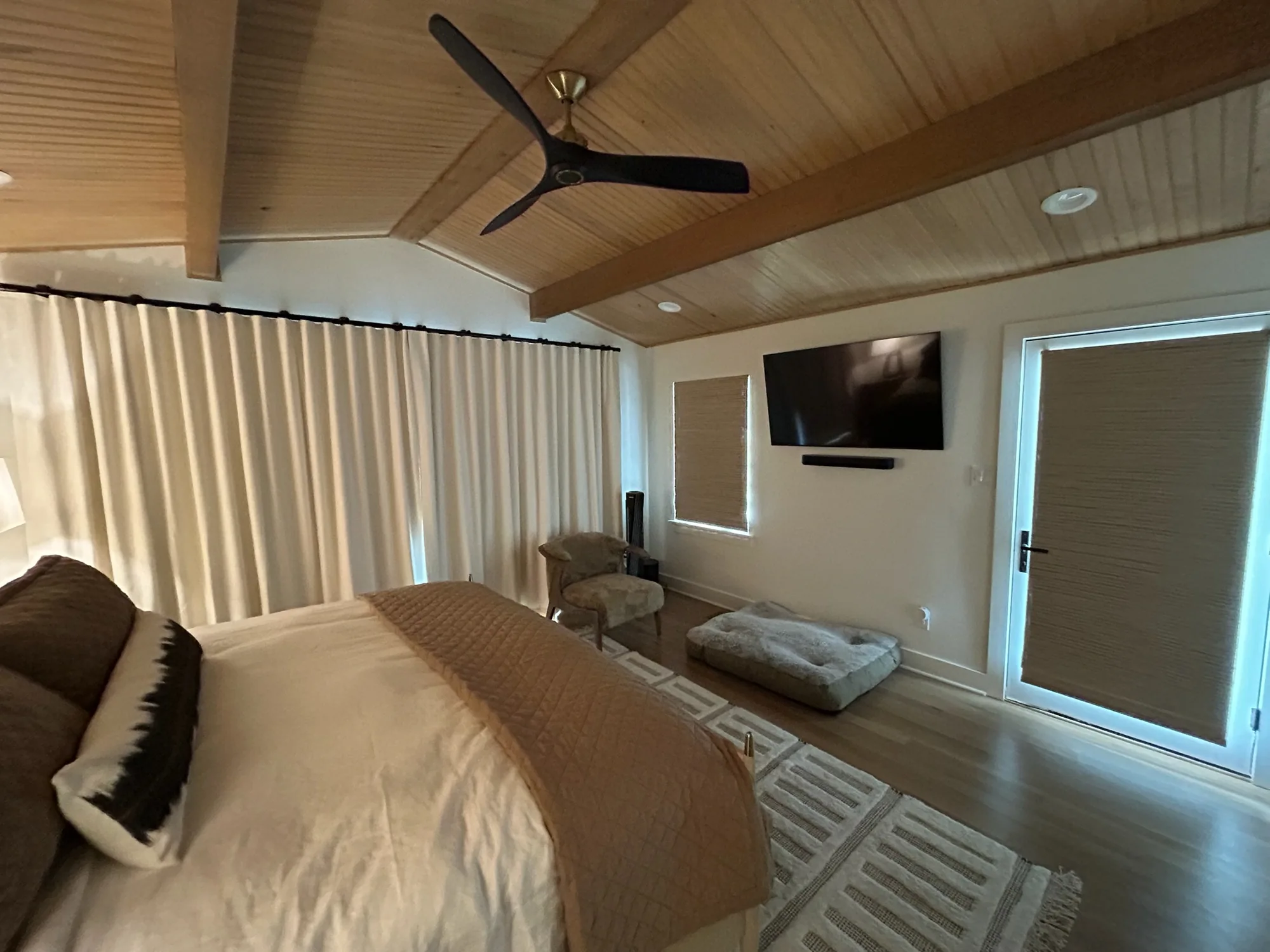 Motorized drapery in a Texas primary bedroom
