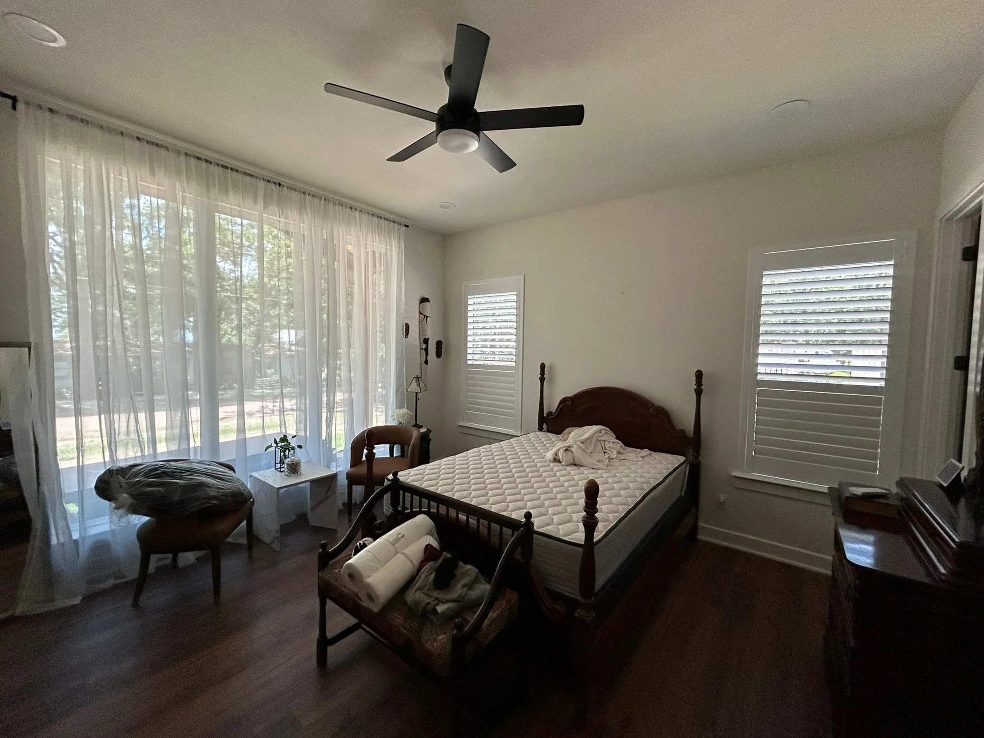 Drapery and motorization across a wide Texas window, installed by Love Is Blinds